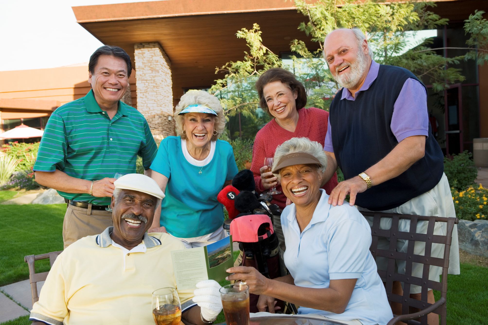 A group of golfers enjoying each other's company.